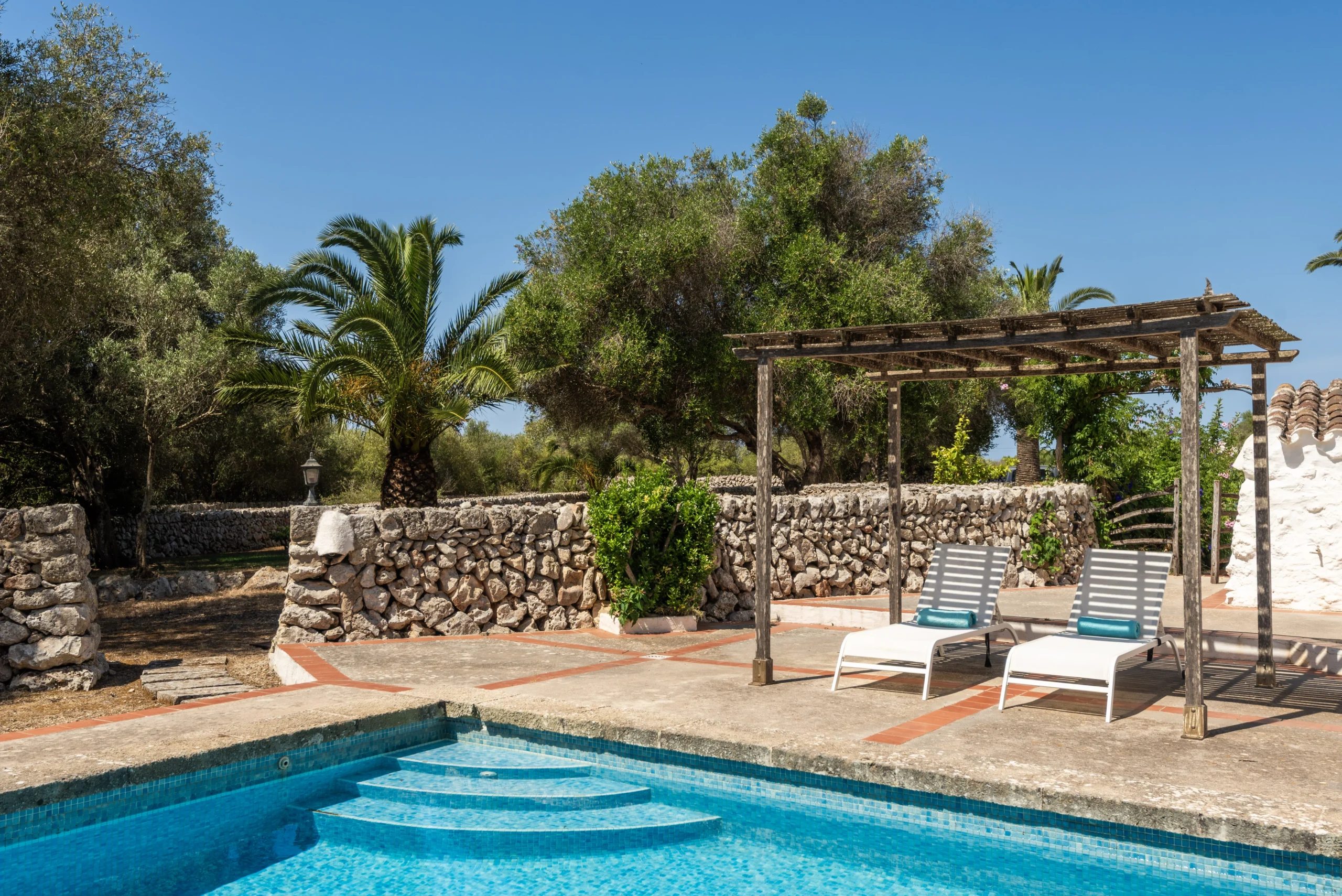 Photograph of the villa with pool in Menorca, Villa Biniparrell Vell, by Green&Blue Villas